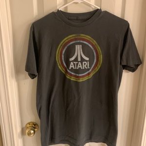 Vintage ATARI Men's Dark Gray Short Sleeve and Crewneck Graph Tee.Size: Medium